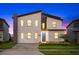 Stunning two-story home with modern design and landscaping at 4535 Narrative Ln, Kissimmee, FL 34746
