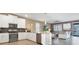 Modern kitchen features stainless steel appliances and an island at 4535 Narrative Ln, Kissimmee, FL 34746