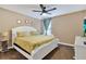 Large bedroom with king-size bed and ample natural light at 4535 Narrative Ln, Kissimmee, FL 34746