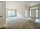 Bright dining room with carpet flooring and large windows at 4394 Sagefield Dr, Harmony, FL 34773