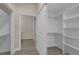 Large walk-in closets with built-in shelving at 216 Shady Oaks Cir, Lake Mary, FL 32746