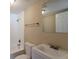 Clean bathroom with a tub, toilet, sink, and mirror at 1506 W 16Th St, Sanford, FL 32771