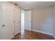 Spacious bedroom with hardwood floors and neutral walls at 1506 W 16Th St, Sanford, FL 32771