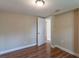 Bright bedroom featuring hardwood floors and neutral walls at 1506 W 16Th St, Sanford, FL 32771