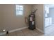 Laundry area with a new water heater and tile floor at 1506 W 16Th St, Sanford, FL 32771