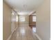 Bright entryway with tiled floors and neutral walls at 1506 W 16Th St, Sanford, FL 32771