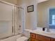 Clean bathroom with shower/tub combo and wood vanity at 535 Crimson Ln, Winter Springs, FL 32708