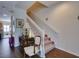Classic staircase with white railings, leading to the upper floor at 535 Crimson Ln, Winter Springs, FL 32708