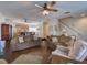 Open living room and kitchen area with hardwood floors at 535 Crimson Ln, Winter Springs, FL 32708