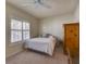 Spacious bedroom with large window and plush bedding at 535 Crimson Ln, Winter Springs, FL 32708