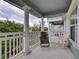 Private balcony with white railings and views of neighborhood at 535 Crimson Ln, Winter Springs, FL 32708