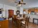 Classic dining room with wood table and chairs, hardwood floors at 535 Crimson Ln, Winter Springs, FL 32708