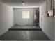 Unfinished basement with water heater and plumbing at 512 W Ella J Gilmore St, Apopka, FL 32703