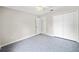 Bedroom with a ceiling fan and large closet at 5418 S Bracken Ct, Winter Park, FL 32792