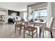 Dining room with a table, chairs, and view into adjacent living space at 3345 Aruba Way, Haines City, FL 33844