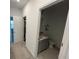 Small bathroom with sink and toilet at 9513 Amber Chestnut Way, Winter Garden, FL 34787