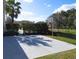 Large backyard with a basketball court and plenty of space at 10542 Wittenberg Way, Orlando, FL 32832