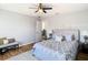 Bright bedroom with built-in storage and hardwood floors at 10542 Wittenberg Way, Orlando, FL 32832