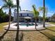 Stunning pool and patio area with lush landscaping at 10542 Wittenberg Way, Orlando, FL 32832