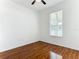 Bedroom with wood flooring and a window at 3623 Weatherfield Dr, Kissimmee, FL 34746