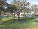 Dog park with benches and waste disposal stations at 3623 Weatherfield Dr, Kissimmee, FL 34746