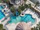 Aerial view showing a large, freeform pool with a waterslide at 3623 Weatherfield Dr, Kissimmee, FL 34746