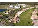 Aerial view of neighborhood with large school nearby at 3623 Weatherfield Dr, Kissimmee, FL 34746
