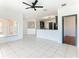 Open concept kitchen with granite island and breakfast bar at 3623 Weatherfield Dr, Kissimmee, FL 34746