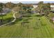 Community park with fitness equipment and walking paths at 3623 Weatherfield Dr, Kissimmee, FL 34746