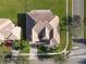 Bird's eye view of house showing roofline, driveway, and landscaping at 3623 Weatherfield Dr, Kissimmee, FL 34746