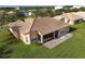 Aerial view of house and surrounding community at 3623 Weatherfield Dr, Kissimmee, FL 34746