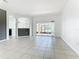 Open floor plan connecting living room, kitchen, and backyard at 3623 Weatherfield Dr, Kissimmee, FL 34746