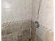 Shower stall with tile surround and built-in seat at 706 Golden Sunshine Cir, Orlando, FL 32807