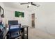 Home office with a computer and built-in shelving at 348 Sand Ridge Dr, Davenport, FL 33896