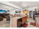 Kitchen boasts a large island and views into the living room at 348 Sand Ridge Dr, Davenport, FL 33896