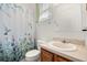 Clean bathroom with shower/tub combo and updated vanity at 348 Sand Ridge Dr, Davenport, FL 33896
