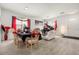 Elegant dining room with a piano and tasteful decor at 348 Sand Ridge Dr, Davenport, FL 33896