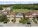 Aerial view of a house in a residential neighborhood at 348 Sand Ridge Dr, Davenport, FL 33896