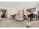 Spacious living room featuring a piano and comfortable seating at 348 Sand Ridge Dr, Davenport, FL 33896
