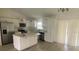 Modern kitchen with island and stainless steel appliances at 13394 Sw 106Th St, Dunnellon, FL 34432