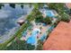 Community pool with surrounding lounge area at 3004 Bird Of Paradise Ln, Kissimmee, FL 34747