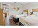 Two twin beds in a well-lit bedroom, additional dresser at 3004 Bird Of Paradise Ln, Kissimmee, FL 34747