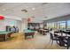 Community clubhouse features a game room with billiards and comfortable seating at 3004 Bird Of Paradise Ln, Kissimmee, FL 34747