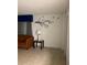Living room with orange couch and decorative wall art at 6165 Carrier Dr # 2113, Orlando, FL 32819