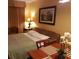 Bedroom with a queen bed and plenty of natural light at 6337 Parc Corniche Dr # 2106, Orlando, FL 32821