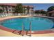 Inviting community pool with ample deck space at 6337 Parc Corniche Dr # 2106, Orlando, FL 32821