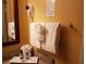 Clean bathroom with granite countertop and fresh towels at 6337 Parc Corniche Dr # 2106, Orlando, FL 32821