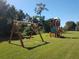playground with swings and playset at 6337 Parc Corniche Dr # 2106, Orlando, FL 32821