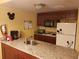 Well-equipped kitchen with granite countertops and appliances at 6337 Parc Corniche Dr # 2106, Orlando, FL 32821