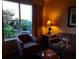 Bright living room featuring comfortable seating and large window at 6337 Parc Corniche Dr # 2106, Orlando, FL 32821